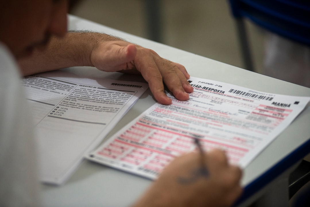 Person filling out an online form - b-1 visitor visa attorney Person filling out an online form - b-1 visitor visa attorney