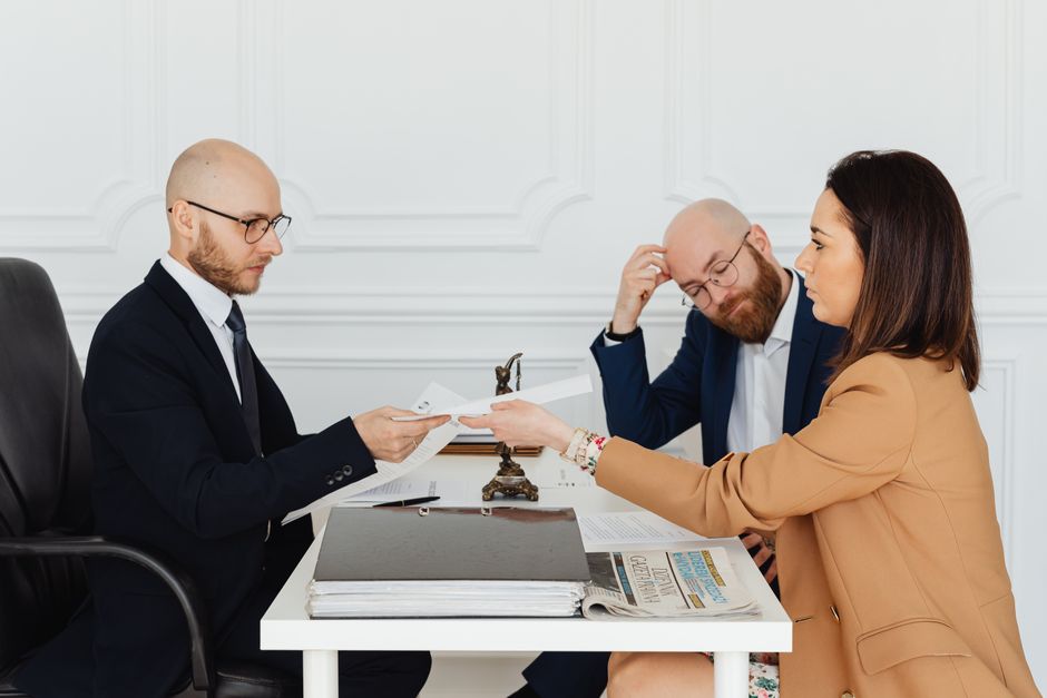 of an attorney speaking with a client in a professional setting - ICE detention release of an attorney speaking with a client in a professional setting - ICE detention release