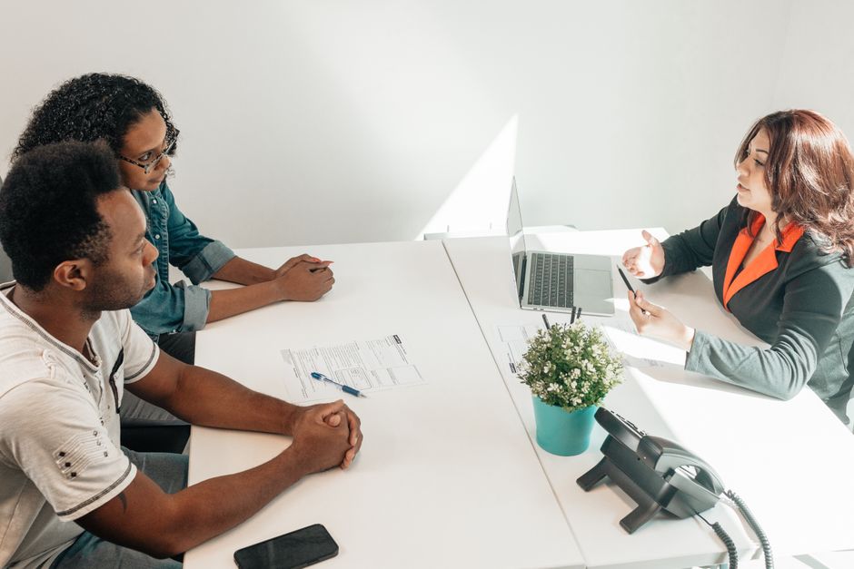 professional meeting between a lawyer and a client in a modern office setting - japanese immigration lawyers professional meeting between a lawyer and a client in a modern office setting - japanese immigration lawyers