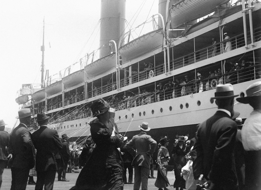 Historical image of immigrants arriving at Ellis Island - US immigration law